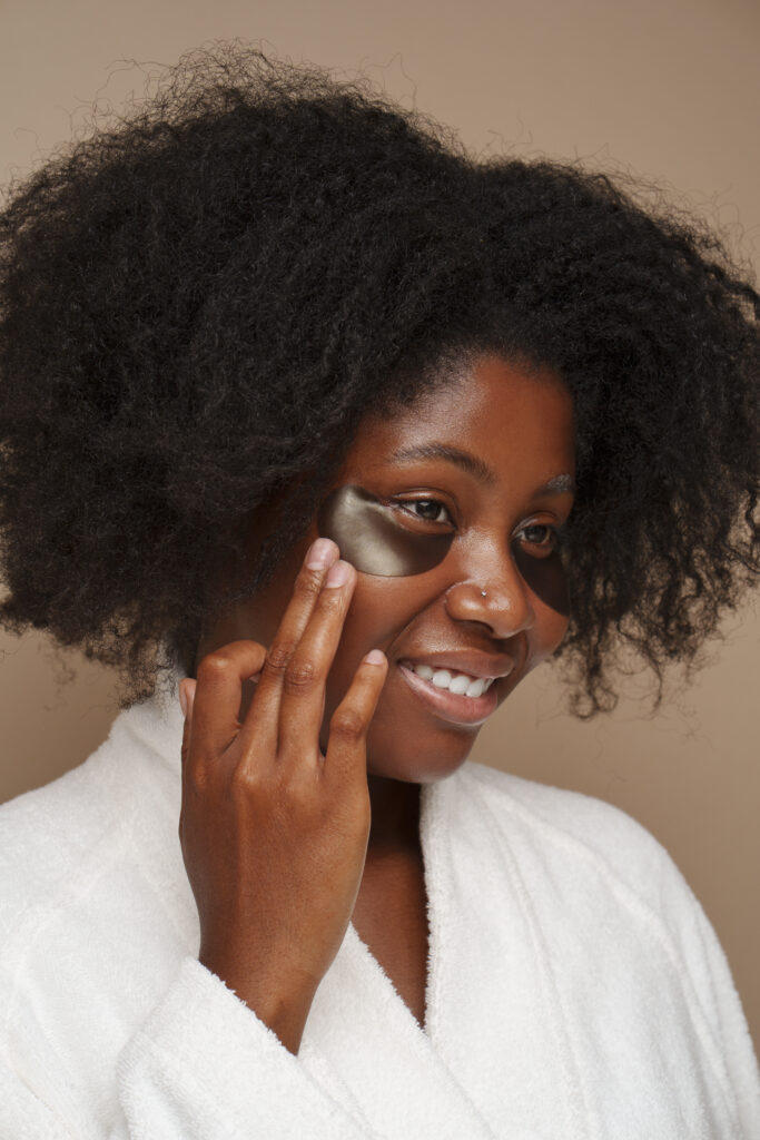 portrait woman using eye patches beauty